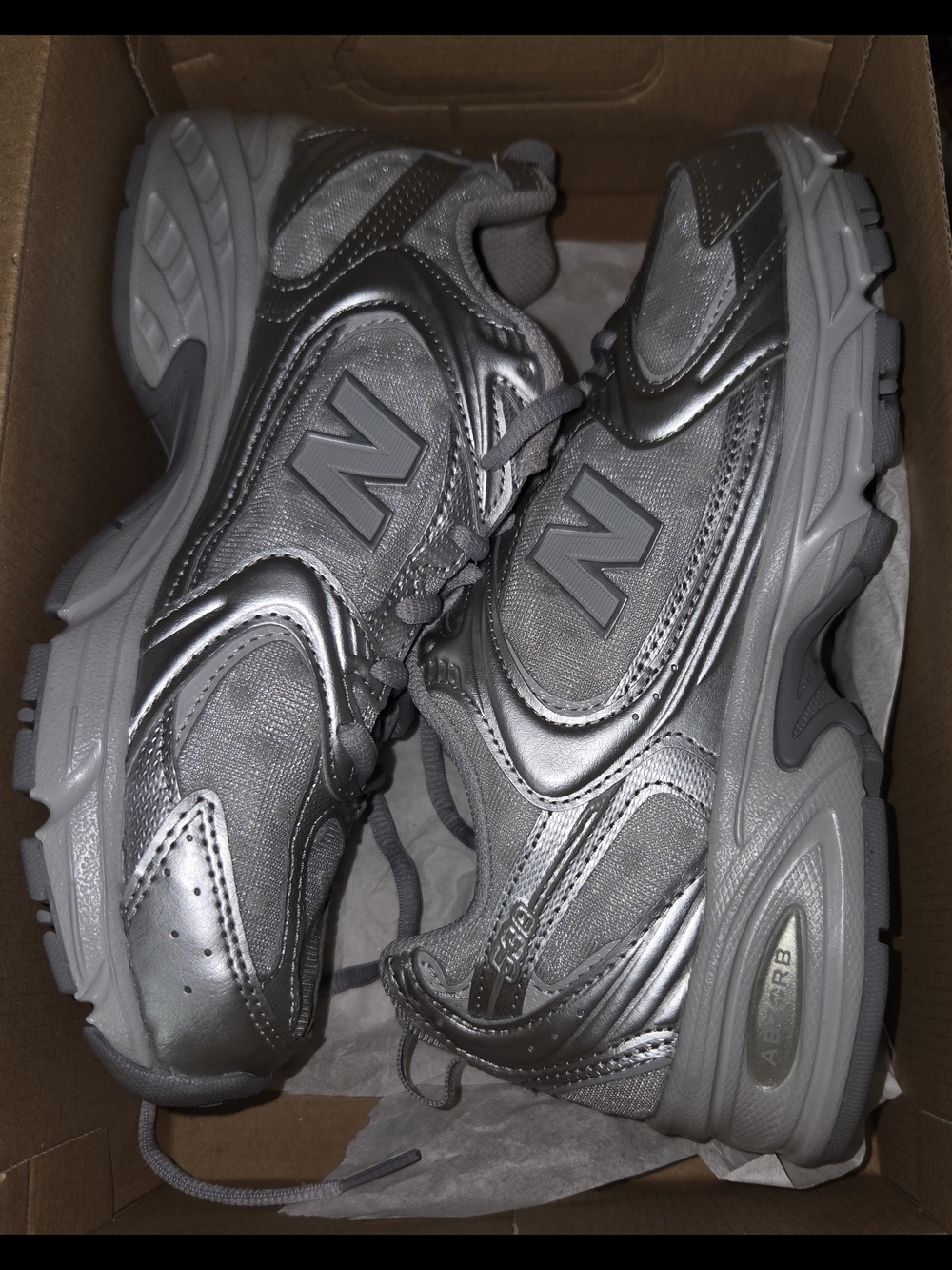 New Balance Silver Metallic Running Sneakers